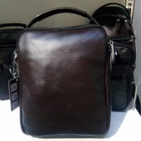 Утеряна мужская коричневая барсетка