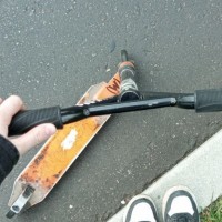 Пропал черно-оранжевый  трюковой самокат FOX pro