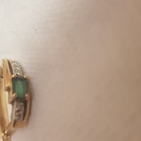 Ппотеряна серьга золотая с изумрудом