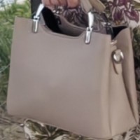 Утеряна женская сумка с паспортом и кошельком